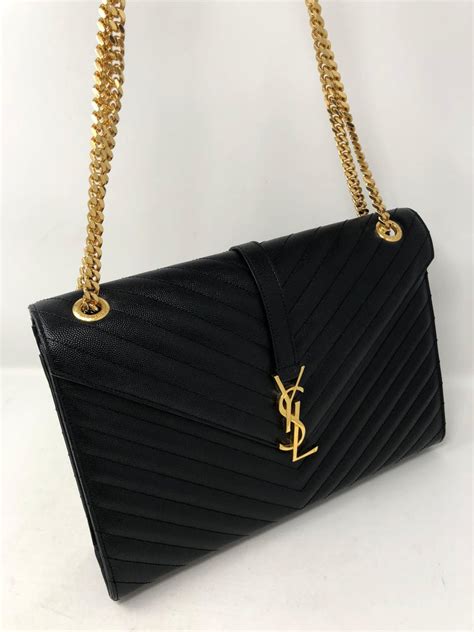 black ysl purse|ysl black purse price.